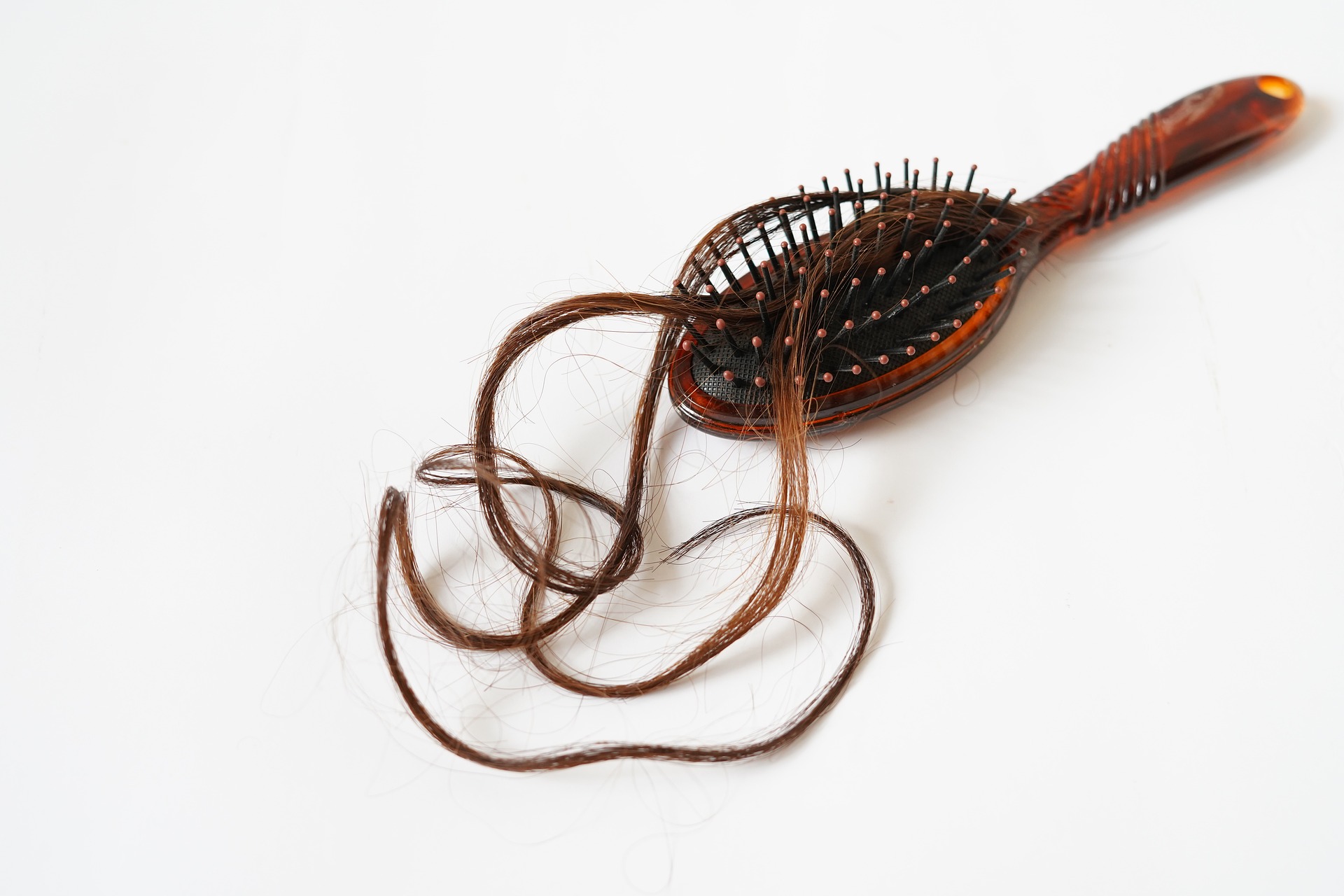 Hair loss - hair on a comb