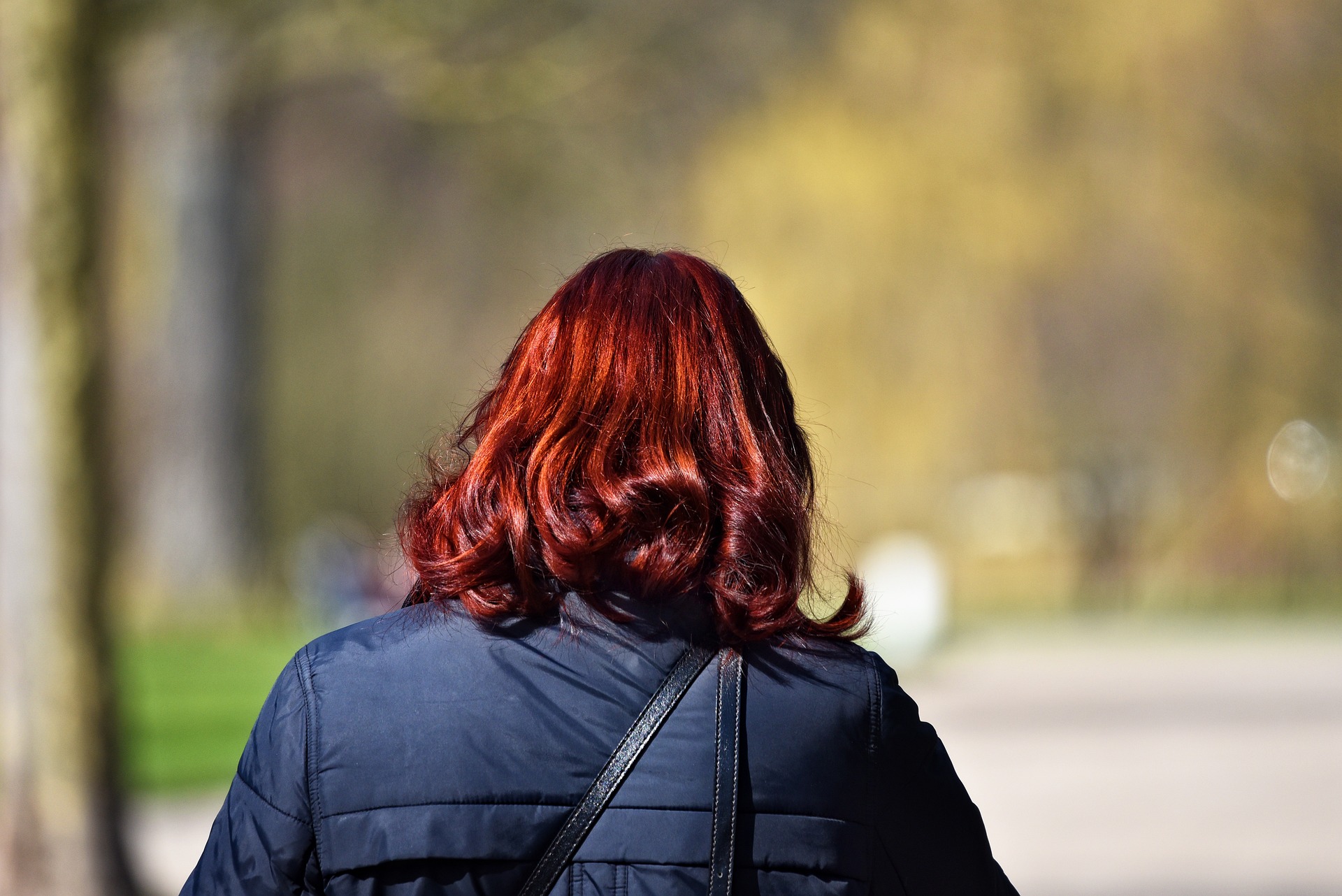 woman with shiny red hair