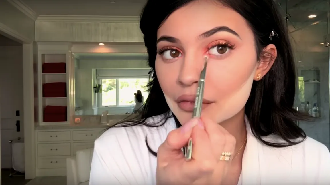 Kylie Jenner doing a makeup tutorial